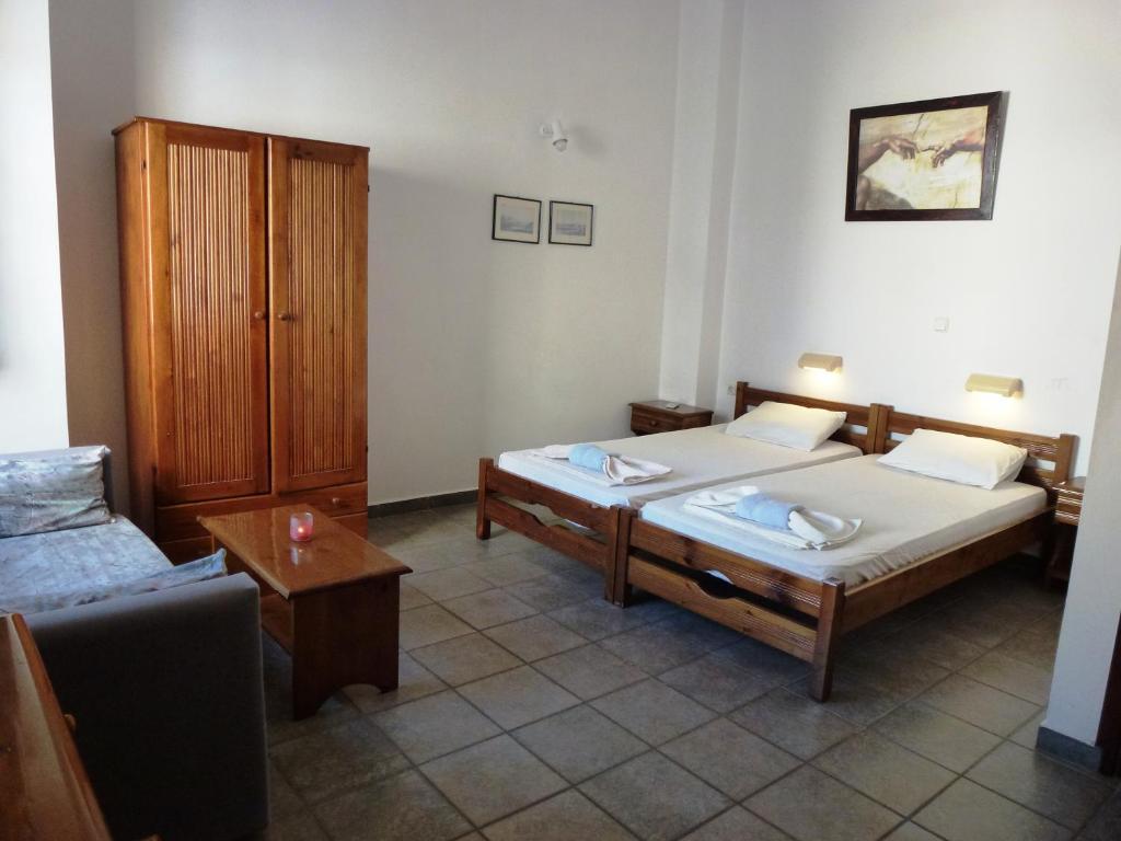 Odos Odysseos Aparthotel Ermoupoli Habitación foto
